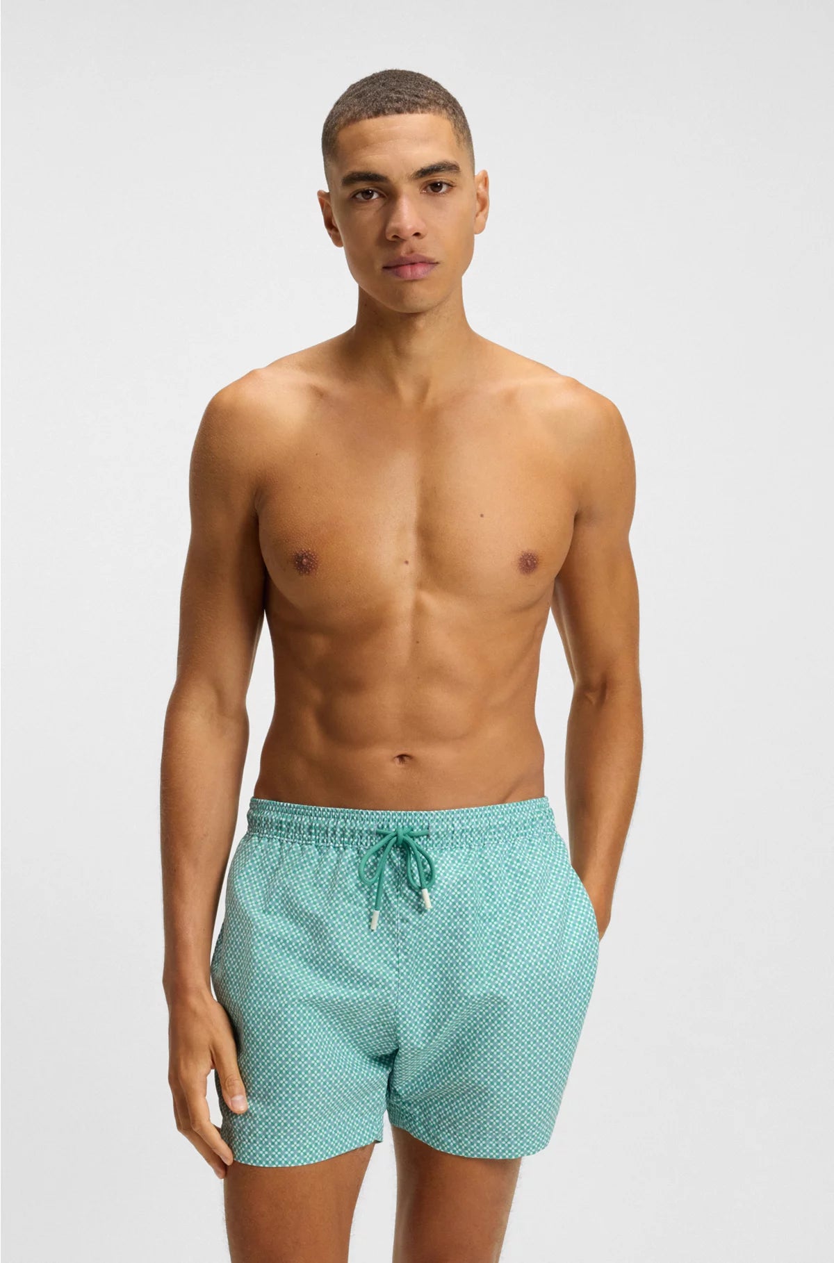 PRINTED SWIM SHORTS WITH LOGO BADGE